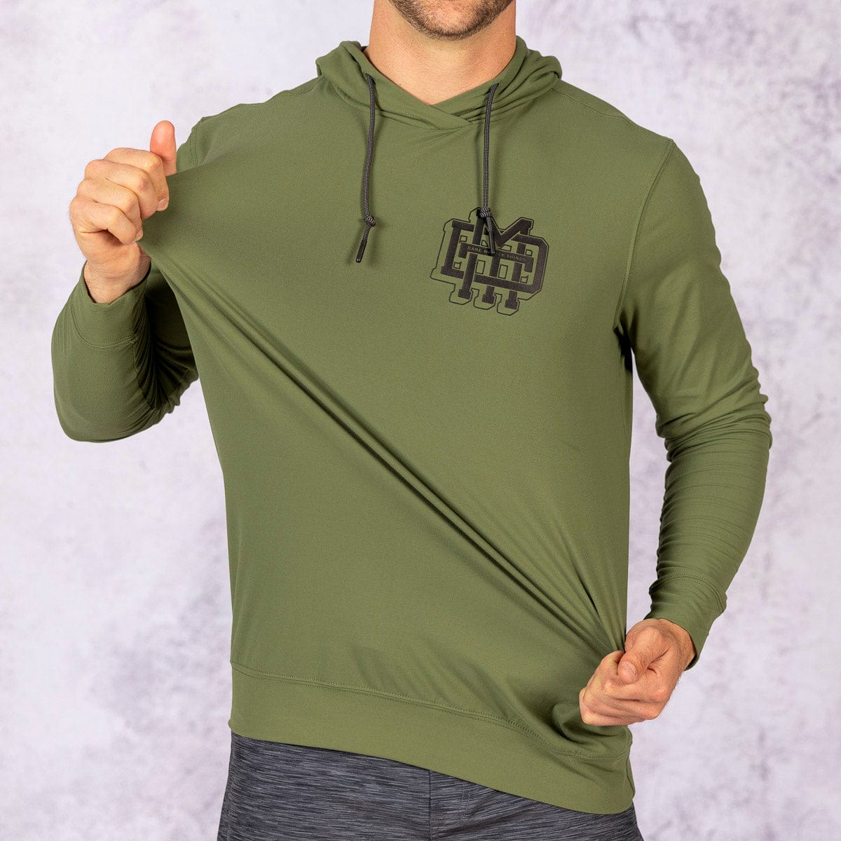 The Monogram (Surplus Olive) – Performance Hoodie - Image 5